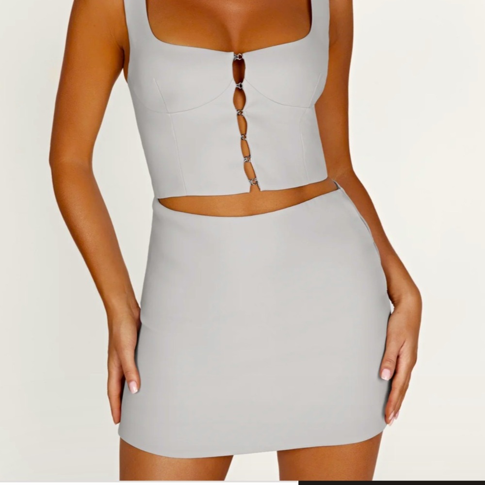 MESHKI Lainey hook and eye mini skirt. Size Small Brand new with tags.